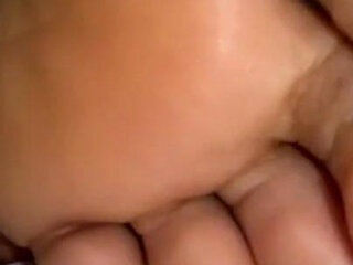 Ebony Girl Under Her Covers in Bed Show off Feet