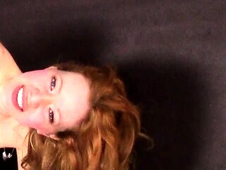 Redhead slut with big boobs goes down