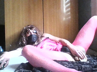 Sissy Crossdresser plays with a continued