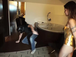 Crazy femdom chick punishing her masked slave