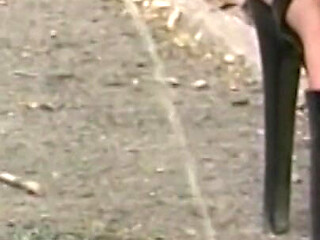 Yellow Pee Between High Heels