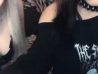 Pale blonde and tanned brunette lesbians toying and licking