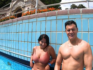 Amy Amor bouncing big natural tits by the pool