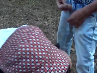 Hot Italian mature on a threesome on the grass