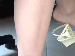 Nyllady Putting on Pantyhose and Footplay with Milk Colored Wedges