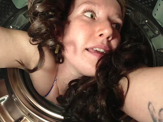A hot brunette girlfriend gets stuck and banged in a washing machine