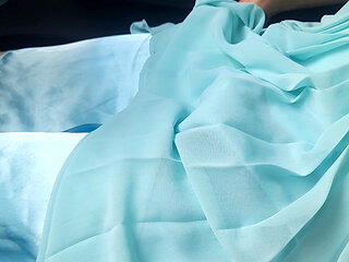 Cum wearing blue chiffon dress with satin lining