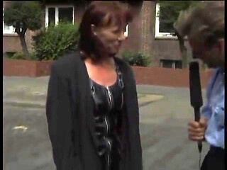 Blonde milf giving an interview