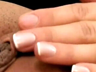 Busty Brunette Fingers Herself to Orgasm