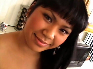 Cute Asian Girl Sucks a Big Black Cock and Gets Fucked in the Kitchen