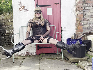 sissy in the garden rubbing her clitty