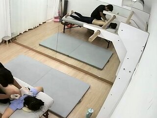 Pink labia close up of naive brunette playing with her name