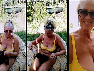 Hot housewife Lukerya in the fresh air in the summer in the yard.
