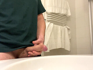 Powerful cumshot in bathroom