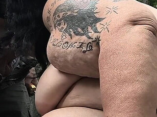 In the Fall Leaves He Bends This Fat Ho Over That Big Tree