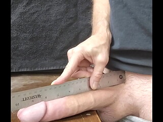 Measuring big white cock