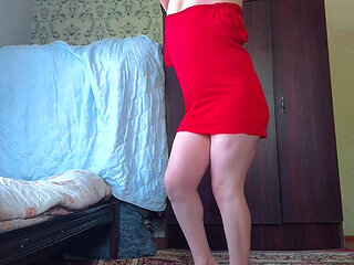 Gorgeous shemale holding heart-shaped balloon playfully
