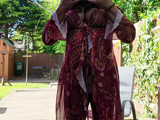 Crossdressing kellycd2022 enjoying the lovely warm weather in nylon and heels