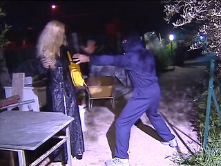 Blond horny MILF fucked on the sofa by masked man