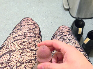 Sissy caged femboy cums in public bathroom