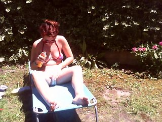 Nicoletta Sunbathes in a Public Garden Wearing a Big Dirty Diaper