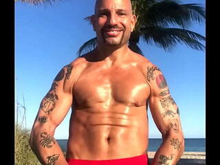 OUTSIDE AT BEACH FLEXING