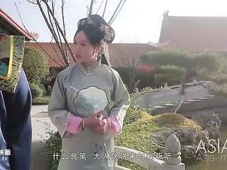 An Asian brunette Cixi is sucking a big loaded dick down on the knees