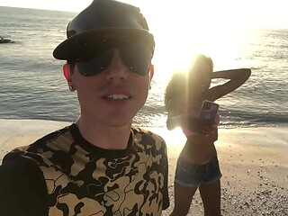 Aiden and astronaut lady at the beach