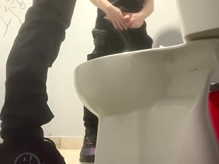 Amateur Friends Pissing Together in the Club's Toilets