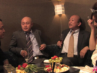 Japanese woman Rui Yazawa sucks two cocks in a bar,uncensored.