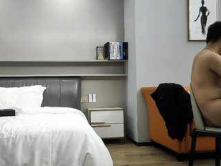 Cute amateur asian web cam girl playing with her toy