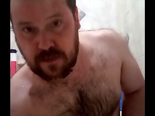Russian bear put on a show in the bathroom: big dick and thick ass.