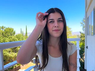 Lily's luscious locks frame her as she sucks Alex's thick cock