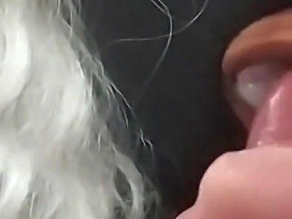 Big-titted milf enjoys sucking three cocks that fill her mouth with lots of hot cum.