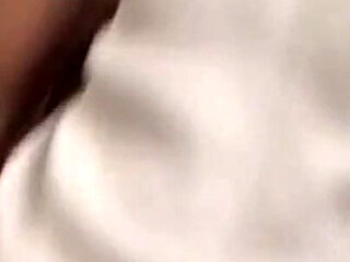 Horny pigtail brunette jerks his cock and gets a warm load on her tits