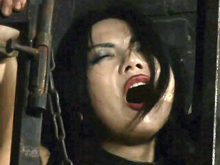 Caged Asian Witch Gets Her Orgasm From a Rough Knotted Rope