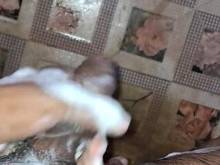 A Young Hindu Boy From India Is Fucking His Thick Cock Hard with His Hands While Taking a Bath