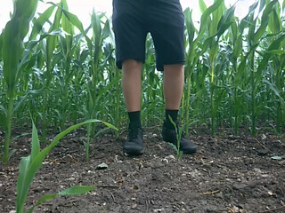 Guy Pissing a Lot Near the Field in Nature