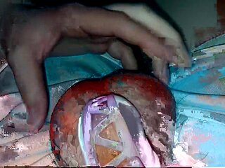 Playing with hubby in his cute pink ribbon chastity cage