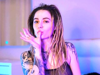 Babe With Dreadlocks And Tattoos Plays With Pussy While...