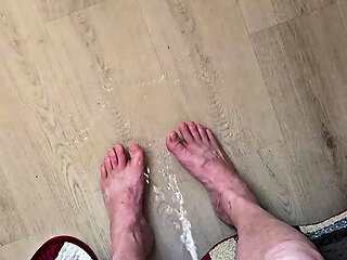 Jerking off while peeing on my feet and then climax on the bottom of my foot covered in it