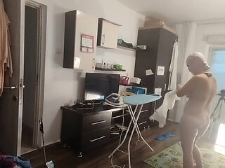 Sexy Brunette Doing Naked Chores Around the House