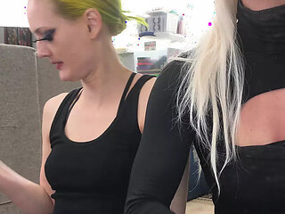 Drag Queen and Woman Putting on Lipliner and Lipstick