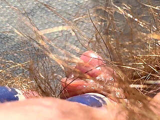 Amateur Hairy Girl Mastubates in Closeup with Huge Clit