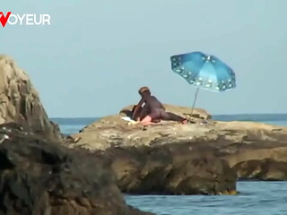 Beach Voyeur. Nude beach photo shoot ended with hardcore sex under the sun