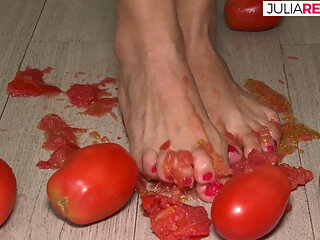 She makes tomato juice naked and gets horny while doing it