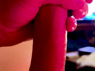 Autofellatio fantasy. Cock gets hard with vibrator watching porn.