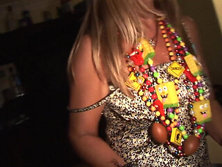 Festive girls naked fun on the bed