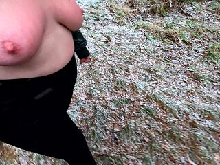 Slapping her tits while hiking through the snow