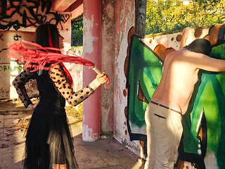 BDSM femdom flogging. Dominatrix Nika punishes her slave at sunset in an abandoned building. Back scratching.
